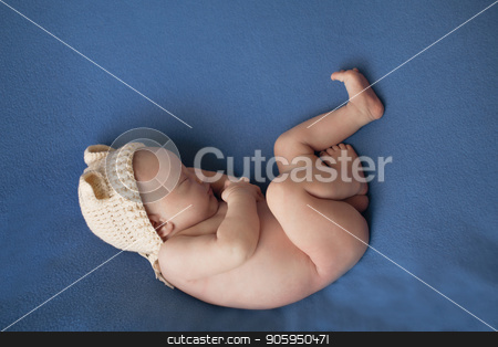 To use this stock image in your creative project, please select the size you need over to the right and click the "Add to Cart" button.
Your downloaded image will come with the Cutcaster watermark removed so don’t worry about the watermark you see on this page. newborn baby lying on a blue background. Imitation of a baby in the womb. beautiful little child sleeping lying on her tummy. Portrait of newborn stock photo, newborn baby lying on a blue background. Imitation of a baby in the womb. beautiful little child sleeping lying on her tummy. Portrait of newborn by aaalll3110