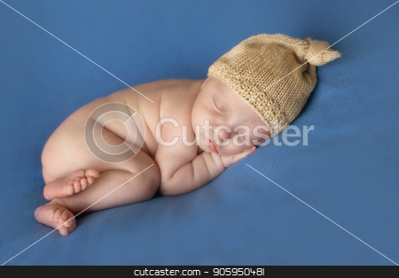 To use this stock image in your creative project, please select the size you need over to the right and click the "Add to Cart" button.
Your downloaded image will come with the Cutcaster watermark removed so don’t worry about the watermark you see on this page. newborn baby lying ina beige cap on a blue background. Imitation of a baby in the womb. beautiful little child in a knitted hat sleeping lying on her tummy. Portrait of newborn stock photo, newborn baby lying ina beige cap on a blue background. Imitation of a baby in the womb. beautiful little child in a knitted hat sleeping lying on her tummy. Portrait of newborn by aaalll3110