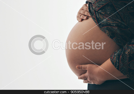 To use this stock image in your creative project, please select the size you need over to the right and click the "Add to Cart" button.
Your downloaded image will come with the Cutcaster watermark removed so don’t worry about the watermark you see on this page. pregnant woman holding hands on belly on a white background stock photo, pregnant woman holding hands on belly on a white background by aaalll3110