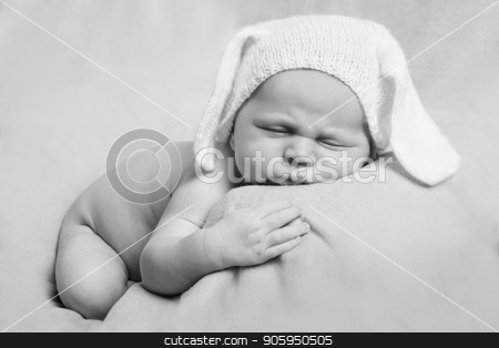 To use this stock image in your creative project, please select the size you need over to the right and click the "Add to Cart" button.
Your downloaded image will come with the Cutcaster watermark removed so don’t worry about the watermark you see on this page. portrait of newborn baby in a hat with ears. Newborn fashion stock photo, portrait of newborn baby in a hat with ears. Newborn fashion by aaalll3110