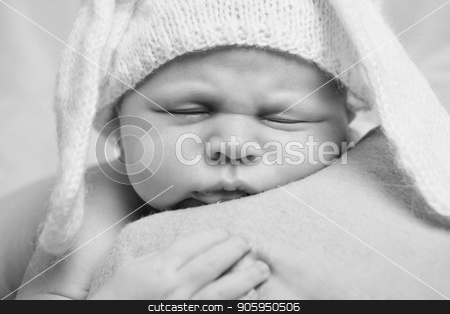To use this stock image in your creative project, please select the size you need over to the right and click the "Add to Cart" button.
Your downloaded image will come with the Cutcaster watermark removed so don’t worry about the watermark you see on this page. portrait of newborn baby in a hat with ears. Newborn fashion stock photo, portrait of newborn baby in a hat with ears. Newborn fashion by aaalll3110