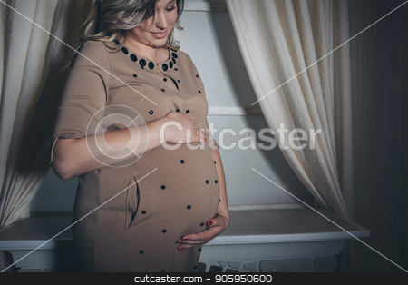 To use this stock image in your creative project, please select the size you need over to the right and click the "Add to Cart" button.
Your downloaded image will come with the Cutcaster watermark removed so don’t worry about the watermark you see on this page. a pregnant woman holding hands on belly stock photo, a pregnant woman holding hands on belly by aaalll3110