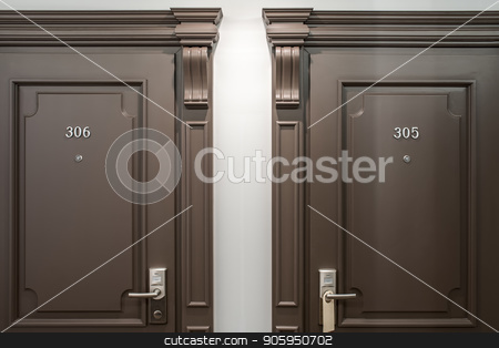 To use this stock image in your creative project, please select the size you need over to the right and click the "Add to Cart" button.
Your downloaded image will come with the Cutcaster watermark removed so don’t worry about the watermark you see on this page. Stylish interior in hotel stock photo, Two brown doors with room numbers on them on the light wall background in the hotel. Closeup horizontal photo. by bezikus