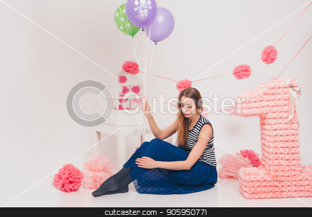 To use this stock image in your creative project, please select the size you need over to the right and click the "Add to Cart" button.
Your downloaded image will come with the Cutcaster watermark removed so don’t worry about the watermark you see on this page. the blonde woman with the colored balls on a white background. Studio portrait of an attractive girl waiting for her birthday. stock photo, the blonde woman with the colored balls on a white background. Studio portrait of an attractive girl waiting for her birthday. by aaalll3110