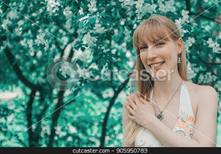 To use this stock image in your creative project, please select the size you need over to the right and click the "Add to Cart" button.
Your downloaded image will come with the Cutcaster watermark removed so don’t worry about the watermark you see on this page. Portrait of a girl on a background of green foliage stock photo, Portrait of a girl on a background of green foliage by aaalll3110