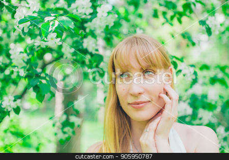 To use this stock image in your creative project, please select the size you need over to the right and click the "Add to Cart" button.
Your downloaded image will come with the Cutcaster watermark removed so don’t worry about the watermark you see on this page. Portrait of a girl on a background of green foliage stock photo, Portrait of a girl on a background of green foliage by aaalll3110