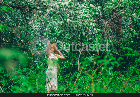 To use this stock image in your creative project, please select the size you need over to the right and click the "Add to Cart" button.
Your downloaded image will come with the Cutcaster watermark removed so don’t worry about the watermark you see on this page. young woman in forest on a background of green foliage stock photo, young woman in forest on a background of green foliage by aaalll3110