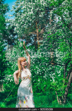 To use this stock image in your creative project, please select the size you need over to the right and click the "Add to Cart" button.
Your downloaded image will come with the Cutcaster watermark removed so don’t worry about the watermark you see on this page. young woman in forest on a background of green foliage stock photo, young woman in forest on a background of green foliage by aaalll3110