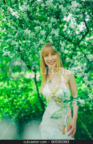 To use this stock image in your creative project, please select the size you need over to the right and click the "Add to Cart" button.
Your downloaded image will come with the Cutcaster watermark removed so don’t worry about the watermark you see on this page. Portrait of a girl on a background of green foliage stock photo, Portrait of a girl on a background of green foliage by aaalll3110