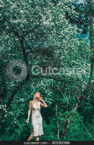 To use this stock image in your creative project, please select the size you need over to the right and click the "Add to Cart" button.
Your downloaded image will come with the Cutcaster watermark removed so don’t worry about the watermark you see on this page. young woman in forest on a background of green foliage stock photo, young woman in forest on a background of green foliage by aaalll3110