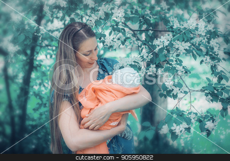 To use this stock image in your creative project, please select the size you need over to the right and click the "Add to Cart" button.
Your downloaded image will come with the Cutcaster watermark removed so don’t worry about the watermark you see on this page. Portrait of a girl with baby on a background of green foliage stock photo, Portrait of a girl with baby on a background of green foliage by aaalll3110