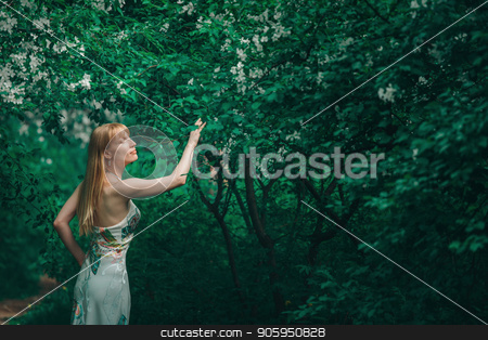 To use this stock image in your creative project, please select the size you need over to the right and click the "Add to Cart" button.
Your downloaded image will come with the Cutcaster watermark removed so don’t worry about the watermark you see on this page. young woman in forest on a background of green foliage stock photo, young woman in forest on a background of green foliage by aaalll3110