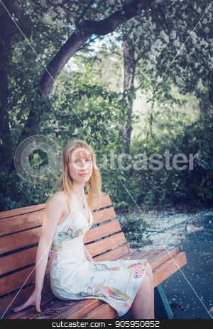 To use this stock image in your creative project, please select the size you need over to the right and click the "Add to Cart" button.
Your downloaded image will come with the Cutcaster watermark removed so don’t worry about the watermark you see on this page. Portrait of a girl on a background of green foliage stock photo, Portrait of a girl on a background of green foliage by aaalll3110