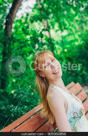 To use this stock image in your creative project, please select the size you need over to the right and click the "Add to Cart" button.
Your downloaded image will come with the Cutcaster watermark removed so don’t worry about the watermark you see on this page. Portrait of a girl on a background of green foliage stock photo, Portrait of a girl on a background of green foliage by aaalll3110