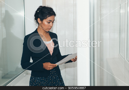 To use this stock image in your creative project, please select the size you need over to the right and click the "Add to Cart" button.
Your downloaded image will come with the Cutcaster watermark removed so don’t worry about the watermark you see on this page. girl in a business suit Asian appearance on a white background in the office working with documents stock photo, girl in a business suit Asian appearance on a white background in the office working with documents by aaalll3110