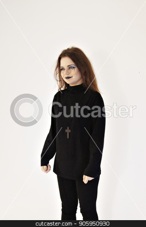 To use this stock image in your creative project, please select the size you need over to the right and click the "Add to Cart" button.
Your downloaded image will come with the Cutcaster watermark removed so don’t worry about the watermark you see on this page. Girl with bright makeup in black suit and with cross on chest on white wall background. Pretty woman in black clothes. Young woman with black lips and red hair stock photo, Girl with bright makeup in black suit and with cross on chest on white wall background. Pretty woman in black clothes. Young woman with black lips and red hair by aaalll3110