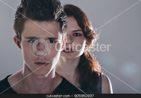 To use this stock image in your creative project, please select the size you need over to the right and click the "Add to Cart" button.
Your downloaded image will come with the Cutcaster watermark removed so don’t worry about the watermark you see on this page. Cropped image of beautiful couple looking at the camera standing straight on gray background stock photo, Cropped image of beautiful couple looking at the camera standing straight on gray background by aaalll3110