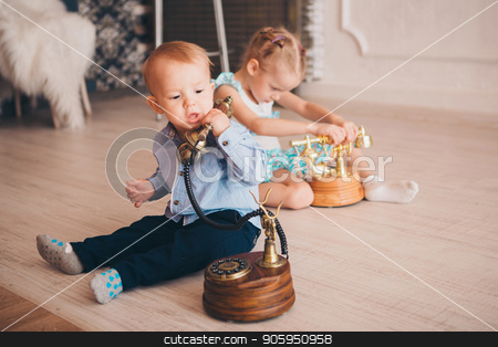 To use this stock image in your creative project, please select the size you need over to the right and click the "Add to Cart" button.
Your downloaded image will come with the Cutcaster watermark removed so don’t worry about the watermark you see on this page. Children play with the phone on the floor. Business concept for beginners. Job interview. business negotiation stock photo, Children play with the phone on the floor. Business concept for beginners. Job interview. business negotiation by aaalll3110