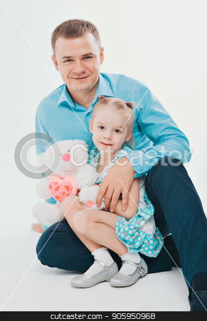 To use this stock image in your creative project, please select the size you need over to the right and click the "Add to Cart" button.
Your downloaded image will come with the Cutcaster watermark removed so don’t worry about the watermark you see on this page. A man with a child in a white background. Father and daughter in blue stock photo, A man with a child in a white background. Father and daughter in blue by aaalll3110