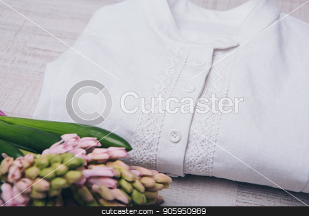To use this stock image in your creative project, please select the size you need over to the right and click the "Add to Cart" button.
Your downloaded image will come with the Cutcaster watermark removed so don’t worry about the watermark you see on this page. rolled up white shirt and flowers close up on white background stock photo, rolled up white shirt and flowers close up on white background by aaalll3110