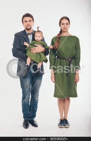 To use this stock image in your creative project, please select the size you need over to the right and click the "Add to Cart" button.
Your downloaded image will come with the Cutcaster watermark removed so don’t worry about the watermark you see on this page. Family photo: mom, dad, child. Fashion in green and grey stock photo, Family photo: mom, dad, child. Fashion in green and grey by aaalll3110