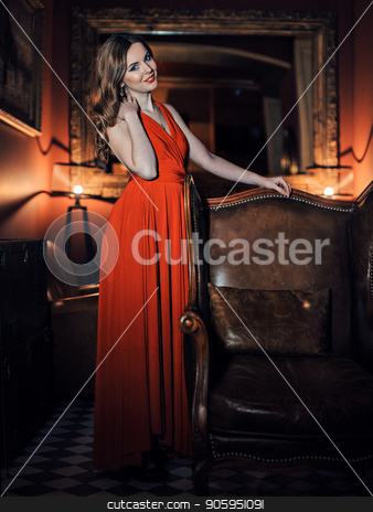 To use this stock image in your creative project, please select the size you need over to the right and click the "Add to Cart" button.
Your downloaded image will come with the Cutcaster watermark removed so don’t worry about the watermark you see on this page. beautiful girl in long red dress standing next to chair stock photo, beautiful girl in long red dress standing next to chair by aaalll3110