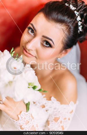 To use this stock image in your creative project, please select the size you need over to the right and click the "Add to Cart" button.
Your downloaded image will come with the Cutcaster watermark removed so don’t worry about the watermark you see on this page. Close-up portrait of the bride with wedding bouquet of white roses. stock photo, Close-up portrait of the bride with wedding bouquet of white roses by Andrii Kobryn