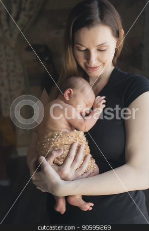 To use this stock image in your creative project, please select the size you need over to the right and click the "Add to Cart" button.
Your downloaded image will come with the Cutcaster watermark removed so don’t worry about the watermark you see on this page. baby on the hands of mother. woman and child stock photo, baby on the hands of mother. woman and child by aaalll3110