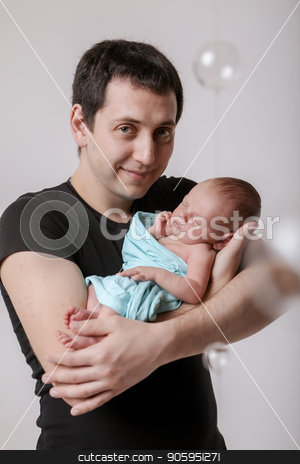 To use this stock image in your creative project, please select the size you need over to the right and click the "Add to Cart" button.
Your downloaded image will come with the Cutcaster watermark removed so don’t worry about the watermark you see on this page. baby on the hands of father. man and child in a black and blue stock photo, baby on the hands of father. man and child in a black and blue by aaalll3110