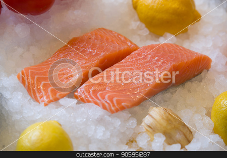 To use this stock image in your creative project, please select the size you need over to the right and click the "Add to Cart" button.
Your downloaded image will come with the Cutcaster watermark removed so don’t worry about the watermark you see on this page. Fresh salmon fillet on ice. stock photo, Fresh salmon fillet on ice with fruit by Shane Maritch