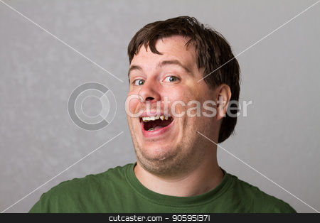 To use this stock image in your creative project, please select the size you need over to the right and click the "Add to Cart" button.
Your downloaded image will come with the Cutcaster watermark removed so don’t worry about the watermark you see on this page. He is way too happy. stock photo, A guy smiling while looking at the camera. Smile is a little much because he is very happy. by txking
