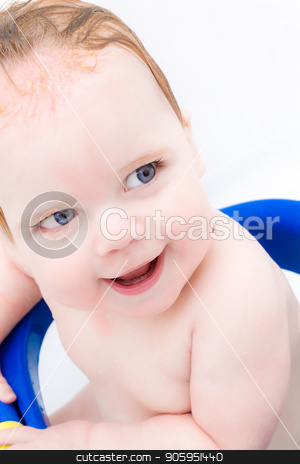 To use this stock image in your creative project, please select the size you need over to the right and click the "Add to Cart" button.
Your downloaded image will come with the Cutcaster watermark removed so don’t worry about the watermark you see on this page. Young child smiling while in a bathring getting ready to get cleaned up stock photo, High key portrait of a young big smiled child getting cleaned in the tub by txking