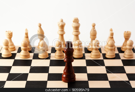 To use this stock image in your creative project, please select the size you need over to the right and click the "Add to Cart" button.
Your downloaded image will come with the Cutcaster watermark removed so don’t worry about the watermark you see on this page. Single chess piece standing up against a collection of different pieces stock photo, Image of a single black piece standing in front of bunch of white pieces, Can be used for racism, diversity, challenge, courage, adversity, or many other uses. by txking