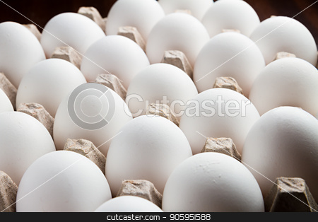 To use this stock image in your creative project, please select the size you need over to the right and click the "Add to Cart" button.
Your downloaded image will come with the Cutcaster watermark removed so don’t worry about the watermark you see on this page. Food, easter, cholesterol, Eggs stock photo, bunch of eggs isolated against a black background still sitting in their tray by txking