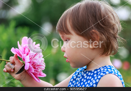 To use this stock image in your creative project, please select the size you need over to the right and click the "Add to Cart" button.
Your downloaded image will come with the Cutcaster watermark removed so don’t worry about the watermark you see on this page. Adorable little girl sniffing purple flowers. stock photo, Adorable little girl sniffing purple flowers. Child and flowers, summer, nature and fun. Summer holidays. by Alfira Poyarkova