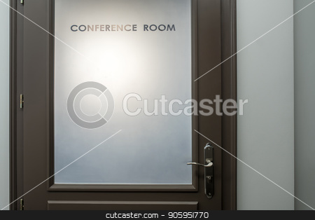 To use this stock image in your creative project, please select the size you need over to the right and click the "Add to Cart" button.
Your downloaded image will come with the Cutcaster watermark removed so don’t worry about the watermark you see on this page. Entrance door to conference room stock photo, Light wall with a brown frosted door with an inscription