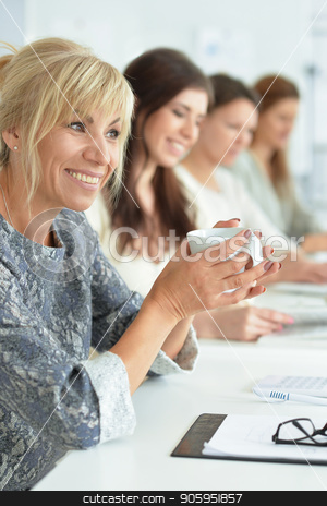 To use this stock image in your creative project, please select the size you need over to the right and click the "Add to Cart" button.
Your downloaded image will come with the Cutcaster watermark removed so don’t worry about the watermark you see on this page. women working in office stock photo, Portrait of beautiful business women working in office by Ruslan Huzau