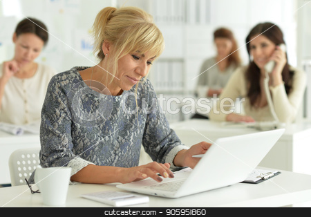 To use this stock image in your creative project, please select the size you need over to the right and click the "Add to Cart" button.
Your downloaded image will come with the Cutcaster watermark removed so don’t worry about the watermark you see on this page. women working in office stock photo, Portrait of beautiful business women working in office by Ruslan Huzau