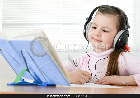 To use this stock image in your creative project, please select the size you need over to the right and click the "Add to Cart" button.
Your downloaded image will come with the Cutcaster watermark removed so don’t worry about the watermark you see on this page. Cute schoolgirl sitting at table and doing homework stock photo, Cute schoolgirl sitting at table and doing homework at home by Ruslan Huzau