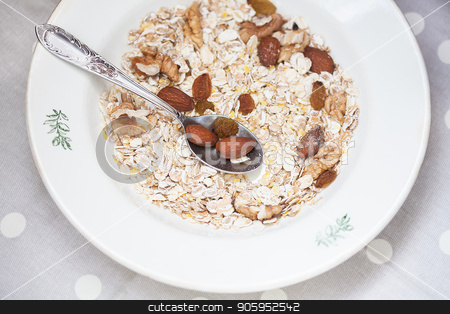 To use this stock image in your creative project, please select the size you need over to the right and click the "Add to Cart" button.
Your downloaded image will come with the Cutcaster watermark removed so don’t worry about the watermark you see on this page. Oatmeal in bowl with nuts, useful food stock photo, Oatmeal in bowl with nuts, useful food. by Sergiy Artsaba