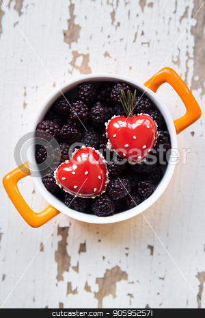 To use this stock image in your creative project, please select the size you need over to the right and click the "Add to Cart" button.
Your downloaded image will come with the Cutcaster watermark removed so don’t worry about the watermark you see on this page. A full blackboy plate with a dessert in the form of a heart stands on a wooden background, close-up stock photo, A full blackboy plate with a dessert in the form of a heart stands on a wooden background, close-up. by Sergiy Artsaba