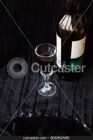 To use this stock image in your creative project, please select the size you need over to the right and click the "Add to Cart" button.
Your downloaded image will come with the Cutcaster watermark removed so don’t worry about the watermark you see on this page. bottle and a glass of red wine on a black background. stock photo, bottle and a glass of red wine on a black background by Sergiy Artsaba