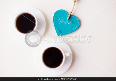 To use this stock image in your creative project, please select the size you need over to the right and click the "Add to Cart" button.
Your downloaded image will come with the Cutcaster watermark removed so don’t worry about the watermark you see on this page. two cups of coffee on the table that says home stock photo, two cups of coffee on the table that says home. by Sergiy Artsaba