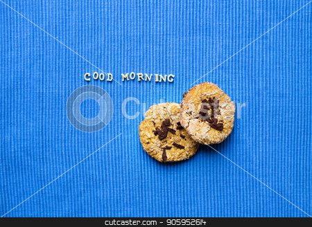 To use this stock image in your creative project, please select the size you need over to the right and click the "Add to Cart" button.
Your downloaded image will come with the Cutcaster watermark removed so don’t worry about the watermark you see on this page. oatmeal cookies on a blue napkin that says good morning stock photo, oatmeal cookies on a blue napkin that says good morning. by Sergiy Artsaba