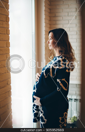 To use this stock image in your creative project, please select the size you need over to the right and click the "Add to Cart" button.
Your downloaded image will come with the Cutcaster watermark removed so don’t worry about the watermark you see on this page. pregnant woman looking out the window stock photo, pregnant woman looking out the window by aaalll3110