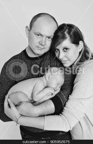 To use this stock image in your creative project, please select the size you need over to the right and click the "Add to Cart" button.
Your downloaded image will come with the Cutcaster watermark removed so don’t worry about the watermark you see on this page. newborn baby lying on the hands of parents stock photo, newborn baby lying on the hands of parents by aaalll3110