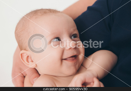 To use this stock image in your creative project, please select the size you need over to the right and click the "Add to Cart" button.
Your downloaded image will come with the Cutcaster watermark removed so don’t worry about the watermark you see on this page. baby on the hands of parents on a white background. a child smiled stock photo, baby on the hands of parents on a white background. a child smiled by aaalll3110