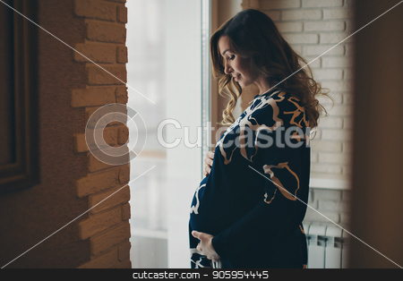 To use this stock image in your creative project, please select the size you need over to the right and click the "Add to Cart" button.
Your downloaded image will come with the Cutcaster watermark removed so don’t worry about the watermark you see on this page. a pregnant woman looking out the window stock photo, a pregnant woman looking out the window by aaalll3110