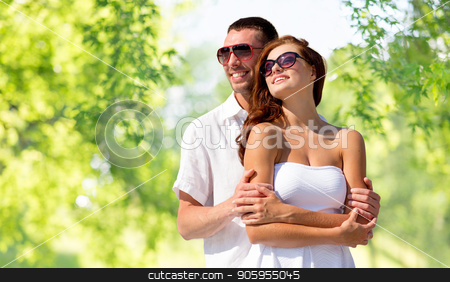 To use this stock image in your creative project, please select the size you need over to the right and click the "Add to Cart" button.
Your downloaded image will come with the Cutcaster watermark removed so don’t worry about the watermark you see on this page. happy smiling couple in sunglasses stock photo, love, summer and relationships concept - happy smiling couple in sunglasses over green natural background by Syda Productions