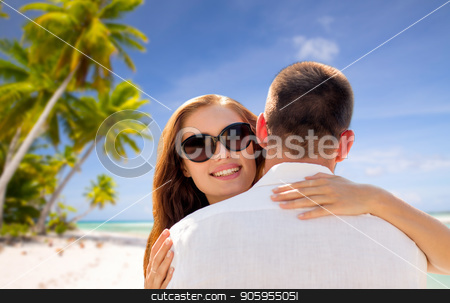 To use this stock image in your creative project, please select the size you need over to the right and click the "Add to Cart" button.
Your downloaded image will come with the Cutcaster watermark removed so don’t worry about the watermark you see on this page. happy couple hugging over tropical beach stock photo, travel, tourism and summer vacation concept - happy couple hugging over tropical beach background in french polynesia by Syda Productions